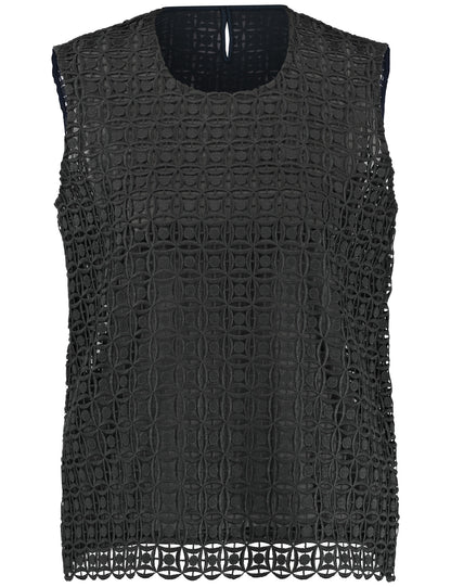 Sleeveless blouse with fine eyelet lace